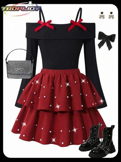 SHEIN 少女时尚优雅T恤套装，白色针织上衣搭配黑色梭织蛋糕裙，上衣饰有黑色蝴蝶结，裙子饰有珍珠。