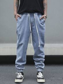 Manfinity Hypemode Lässige amerikanische Stil Jeans mit elastischem Bund und verjüngtem Bein, Herren Loose Fit Jogginghose mit Kordelzug - Blau - Übersicht 1