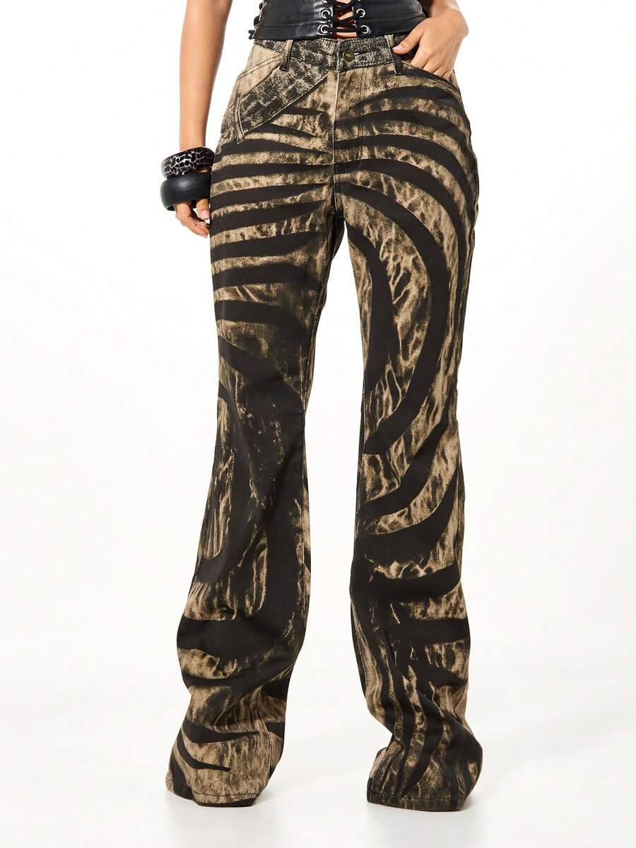 SUMWON WOMEN Low Rise Printed Denim Flare Jeans With Abstract Zebra Pattern And Crossed Waistband Detail - Multicolor - View 1
