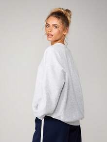 MISSGUIDED Sudadera holgada de mujer con detalle de cartera con botones, cuello redondo, manga larga, parte superior informal