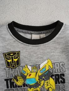 Transformers X SHEIN مجموعة بلوزة طويلة الأكمام وبنطلون رياضي للأطفال الصبية بطبعة روبوت وألوان متباينة، 2 قطعة - متعدد الألوان - مشاهدة 3