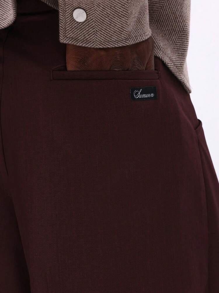 Pantalones plisados de pierna ancha con cintura alta