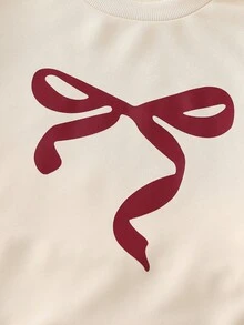 SHEIN 2pcs/Set Fashionable Casual School Style Girls' Apricot Knit Pullover With Bow Print And Red Plaid Pleated Mini Skirt Outfit, Suitable For Outdoor, Travel, Street Style, Daily Casual, Home, Trip, School Season, Daily Matching - Multicolor - View 3