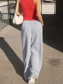 Sydney Algeri Graue Causal Jogginghose im Street Style für Damen mit Bundfalte, Kordelzug, schrägen Taschen und geradem Bein - Grau - Übersicht 2