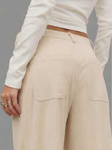 Nöista Cream Corduroy Wide-Leg Pants With High-Rise Fit, Front Patch Pockets, And A Straight Cropped Hem For A Relaxed Yet Polished Silhouette. Perfect For Fall And Winter Outfits - Pair With Knits, Blouses, Or Tailored Outerwear For Chic Everyday Style, City Strolls, Or Casual Gatherings.