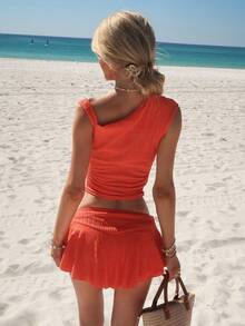 Sydney Algeri Maweii 女士套装，采用不对称露肩上衣和不对称下摆半身裙设计，非常适合休闲场合、郊游、派对、新年庆祝活动、春夏活动、毕业典礼和圣帕特里克节，绿色可选。这款两件套服装采用绿色纹理面料的短下摆半身裙设计，优雅性感，是派对、聚会、俱乐部、音乐节、下午茶和春夏女装时尚的理想之选。 - 橘色 - 查看 2