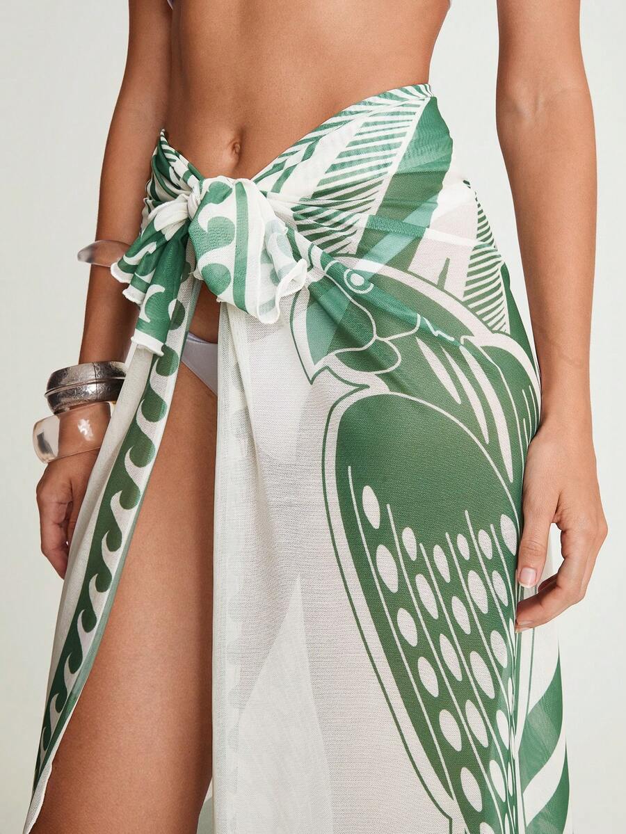 CAJUNI 女士绿白热带印花纱笼裙罩衫 | 轻薄透气面料，长款裹身裙，高开衩设计，醒目的叶子图案和条纹点缀，可调节腰带，优雅性感的沙滩装，是夏季度假、度假村泳池边、浪漫假期的理想之选。女士沙滩时尚，沙滩罩衫，沙滩裙罩衫，纱笼罩衫，泳衣裙罩衫，度假装 - 綠色 - 查看 1