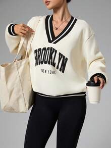 Dewbera Women's Letter Print Drop Shoulder Long Sleeve Loose Fit Sweatshirt Brooklyn Sweatshirt New York Jersey Women Sweatshirt New York Outfits Brooklyn New York Gym Sweatshirt Sporty Chic Gym Clothes Women Oversized - Apricot - View 1