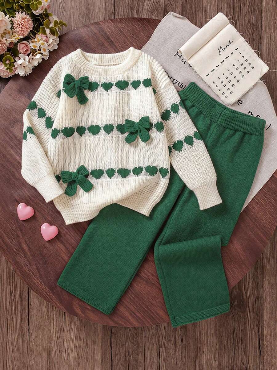 Genkimix Kids Bộ áo len dệt kim hình trái tim và nơ thời trang mới, đa năng, dễ thương cho bé gái, bộ áo len cho bé gái, bộ đồ màu xanh lá cây cho bé gái, bộ đồ mùa đông cho bé gái, bộ đồ dệt kim màu xanh lá cây cho bé gái, bộ đồ phối hợp màu xanh lá cây cho bé gái, bộ đồ mùa đông cho bé gái, bộ hai mảnh quần cho bé gái, bộ đồ mùa xuân và mùa thu cho bé gái, bộ đồ thường ngày đa năng cho bé gái. - màu xanh lá - Xem 1