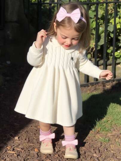 SHEIN Baby Girls Knitted Sweater Dress, White Cable Bow Decor Round Neck Knit Dress, Soft & Comfortable, Suitable For Daily Wear, Outings, Travel, Vacation, Home, Daycare, And Back To School Cream Baby Girl Dress Baby Knitwear Baby Winter Dress Knit Baby Girl Clothes