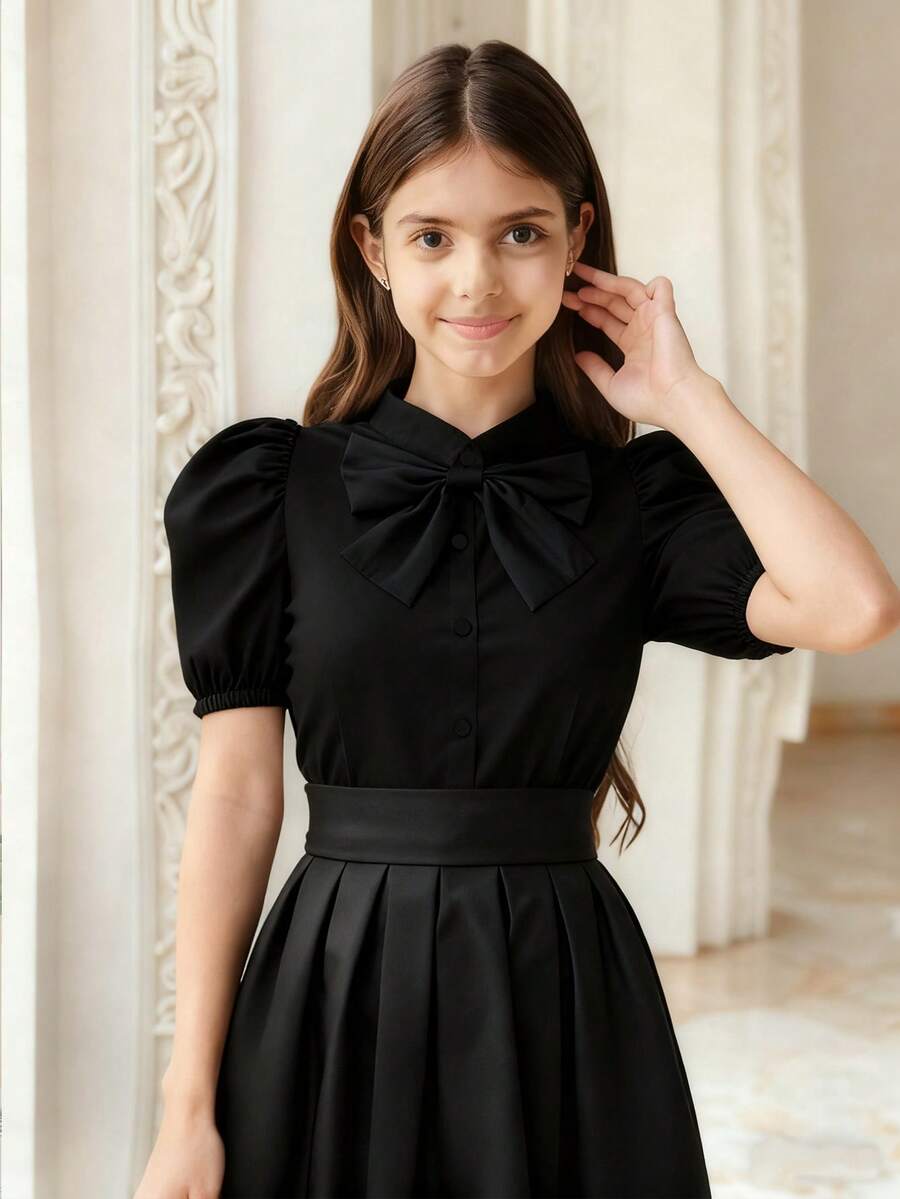 SHEIN Blusa elegante de verano tejida en negro para niñas preadolescentes, blusa formal de regreso a la escuela con mangas abullonadas y lazo desmontable, camisa para cubrir y uso diario en desplazamientos - Negro - Ver 1
