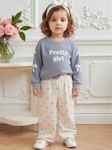 SHEIN Conjunto de sudadera de cuello redondo de manga larga con decoración de lazo rosa y pantalones de pana para bebé niña recién nacida de 0 a 3 años, conjunto de sudadera y pantalones para bebé niña de otoño/invierno, conjunto de bebé niña, ropa diaria para bebé niña - Gris Claro - Ver 1