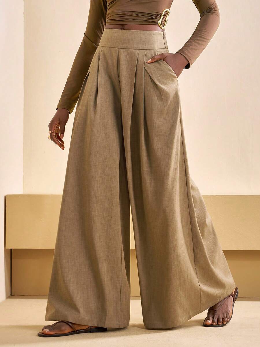 Zivah 2025秋冬新款休闲通勤宽松驼色亚麻材质不规则褶裥口袋高腰阔腿女裤，适合圣诞节、新年、日常出行、节日、购物、旅行、早午餐、机场穿搭、派对、约会、返校、休闲、背带裤等场合。