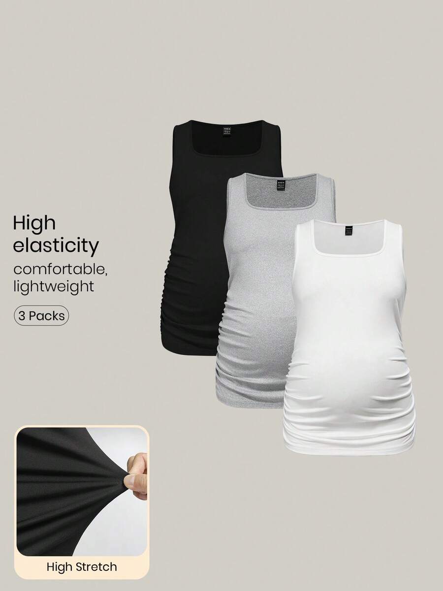 Modmama Set de 3 camisetas de tirantes de unicolor para maternidad, slimming, casuales y sencillas, perfectas para el verano - Blanco y Negro - Ver 1