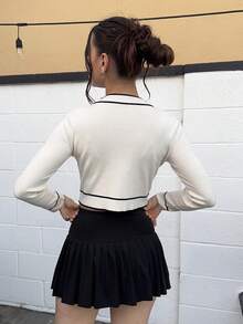 Andrea Bello كارديجان أبيض بأربطة تباين وأزرار أمامية، ملابس علوية بأكمام طويلة للخريف/الشتاء - لون مشمشي - مشاهدة 2