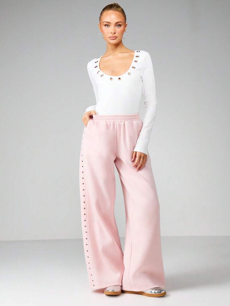 MISSGUIDED Pantalones jogger de ajuste relajado con detalles de ojetes y rayas laterales para comodidad casual