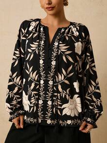 Travachic 大码女式黑色花卉印花长袖衬衫，V领流苏系带图案上衣 - 黑色 - 查看 1