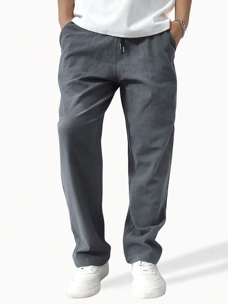 Manfinity Homme Herren Lose einfarbige Hose mit Kordelzug in der Taille und geradem Bein, Herren Leinen Hose, Herren Gerade Bein Jogginghose, Herren Hose mit Kordelzug, Herren Hose, Herren Gerade Lose Graue Hose - Dunkelgrau - Übersicht 1