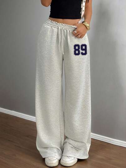 SHEIN Tween Girls Casual Floral & Numeric Print Sweatpants, Relaxed Fit Low Waist Elastic Waistband Wide Leg Pants, Suitable For Spring, Summer, Autumn, Winter