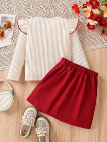 SHEIN 两件套女童时尚杏色柔软罗纹圆领荷叶袖卫衣，饰有3D爱心图案，搭配红色灯芯绒珍珠贴片A字裙，适合派对、日常穿着，秋冬季节穿着。 - 白色 - 查看 2