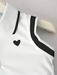 SHEIN Playful Pals 两件套女童爱心印花翻领无袖上衣搭配饰有缎带的百褶裙，适合夏季返校季穿着，女童校服套装，网球裙套装，儿童女童校服连衣裙，可爱校服制服。两件套女婴爱心刺绣Polo领无袖上衣搭配松紧腰百褶裙，甜美可爱街头风穿搭，优雅大方。夏季套装。 - 黑色 - 查看 3