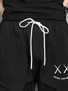 Claim Dot بنطلون رجالي فضفاض بجيب قابل للطي وخصر مربوط بسحاب مطبوع عليه حروف وتعبيرات - الأسود - مشاهدة 6