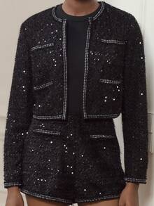 lacRébo Chaqueta corta de estilo tweed negro con sutiles lentejuelas y ribetes contrastantes - Atuendo sofisticado - Negro - Ver 4