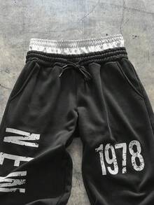 AXEPEAK Conjunto de sudadera con capucha casual para hombres con lavado ácido, con estampado, cintura de doble capa, para primavera/otoño, elástico - Negro - Ver 3