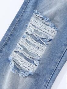 SHEIN 这款少女复古做旧牛仔休闲裤采用褪色青铜色调水洗工艺，饰有破洞和做旧细节，弹性腰带穿着舒适，纽扣前襟方便穿脱，宽松版型修饰身形。适合外出、约会、朋友聚会、返校以及春夏休闲穿着。 - 淺色水洗藍 - 查看 5