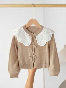 SHEIN LMoss Kids 女童卡其色针织毛衣，蝴蝶结装饰，可爱休闲，柔软舒适，百搭实用，适合居家、派对、节日等各种场合，也适合春、夏、秋、冬四季穿着，是圣诞节的绝佳礼物。 - 卡其色 - 查看 1