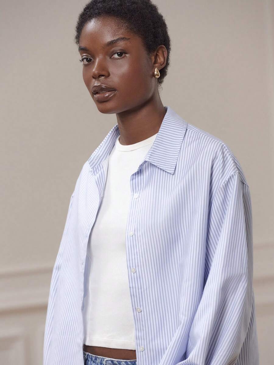 lacRébo Áo sơ mi kẻ sọc xanh dương tay phồng, kiểu dáng thanh lịch cổ điển, phù hợp cho công sở hoặc đi chơi. - Nhiều màu - Xem 1