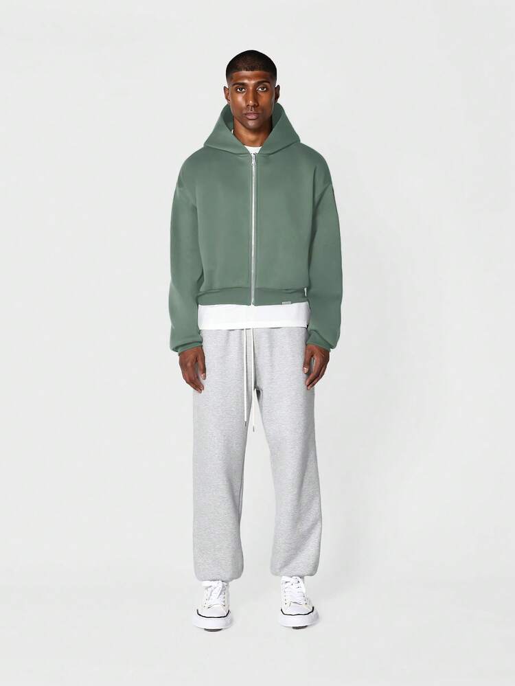 Chaqueta con capucha corta y cremallera