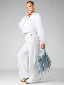 Missguided x Playboy Pantalon de jogging ample à cordon de serrage pour femmes, vêtements de détente casual avec imprimé logo, pantalon confortable pour tous les jours - Gris - Voir 5