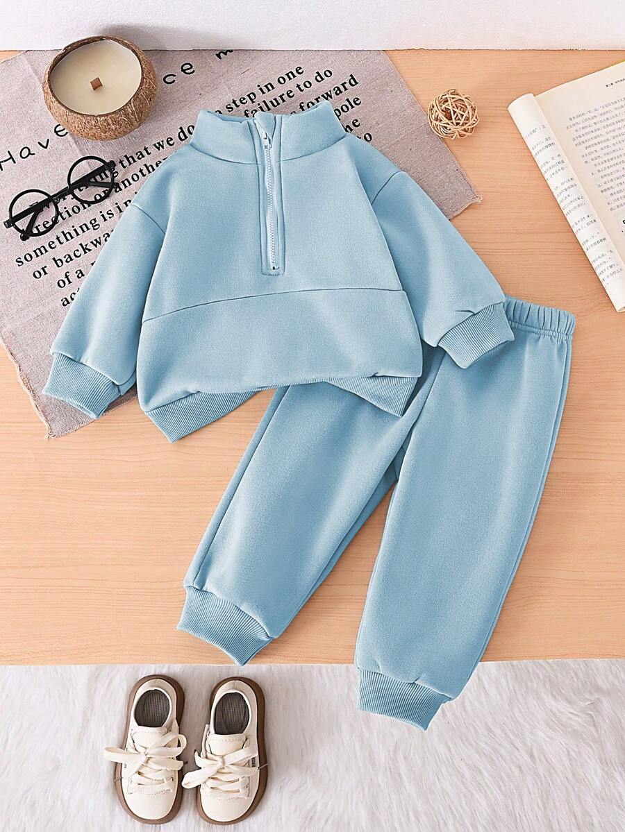 SHEIN Playful Pals Set de hanorac cu fermoar în culoarea uni și pantaloni cu șnur în talie pentru bebeluși băieți, o ținută confortabilă, potrivită pentru bebeluși băieți toamna și primăvara. Acest set este versatil, potrivit pentru diverse ocazii în viața de zi cu zi. Rămâne la modă și confortabil primăvara și toamna. - Albastru - Vizualizare 1