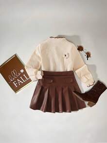 Ensemble tee-shirt col roulé pour préadolescentes avec surpiqûres contrastées, appliqué floral à l'avant et mini-jupe en PU. Tenue pour les sorties d'automne/hiver - Nude - Voir 6