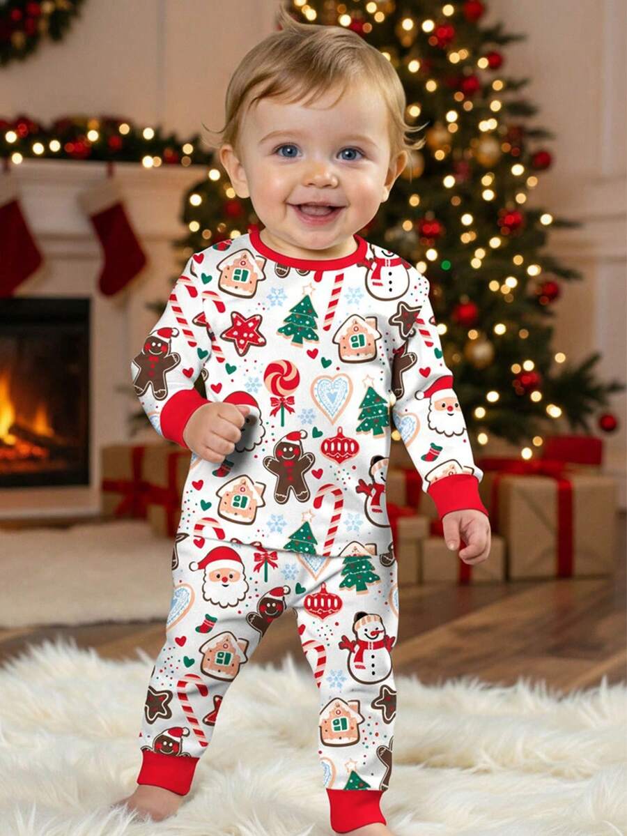 SHEIN Bộ đồ ngủ tay dài thoải mái, vừa vặn, thoải mái, tối giản, thoải mái cho bé trai, ông già Noel hoạt hình dễ thương, người bánh gừng, người tuyết, cây thông Noel, chuông, kẹo gậy, họa tiết bông tuyết, màu đỏ Giáng sinh, phù hợp cho mùa thu/đông - Nhiều màu - Xem 1
