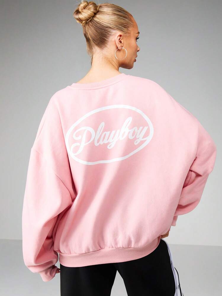 Missguided x Playboy Oversized Crew Neck Sweatshirt With Oval Logo Print For Casual Comfort