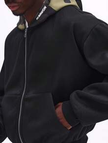 Áo hoodie SUMWON dáng rộng, khóa kéo toàn thân, lót mũ họa tiết rằn ri và túi trước, thích hợp cho phong cách đường phố mùa đông thường ngày. - màu đen - Xem 4