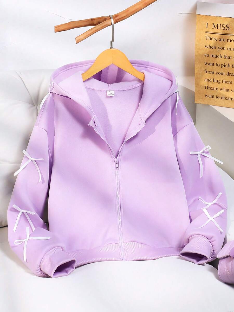 SHEIN Áo khoác nỉ nơ thời trang màu trơn cho bé gái tuổi teen, vải nỉ nỉ thoải mái, thiết kế tay áo thời trang, phong cách trẻ trung và năng động cho bé gái, thích hợp cho mùa tựu trường hoặc mặc ngoài trời hàng ngày - Màu tím - Xem 1