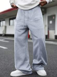 Manfinity EMRG 男士休闲街头风，百搭INS单品：宽松拼接运动裤，适合街头穿搭、日常休闲、周末郊游、音乐节、社交聚会等各种场合。这款裤子是男士衣橱中必备的百搭单品，也是送给男友或老公的绝佳礼物。街头风、朋友、情侣装、宽松、男士、印花、日系、男女皆宜、我爱我的女朋友 - 灰色 - 查看 5