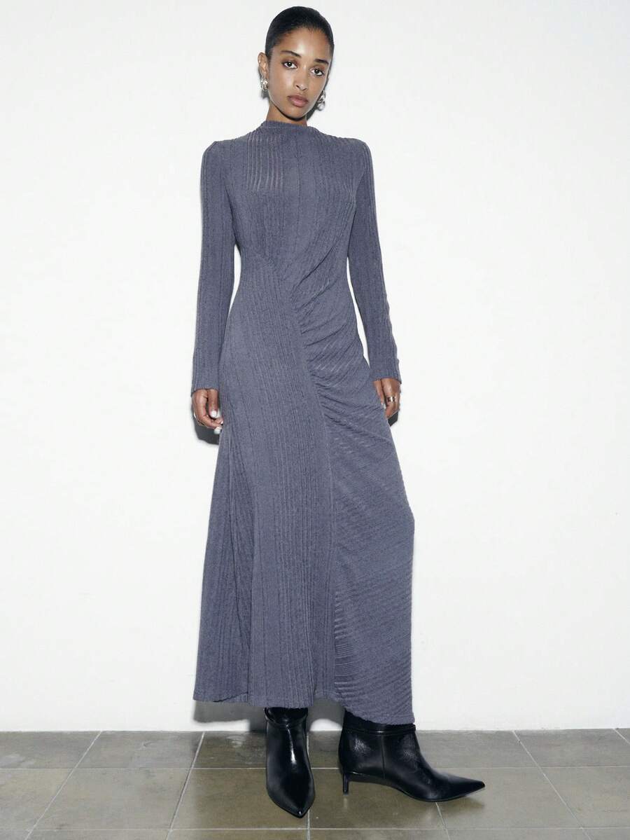 Nöista Elegant Long Grey Ribbed Dress Featuring A High Neckline, Soft Stretch Texture And A Ruched Waist That Creates A Refined And Feminine Shape; An Ideal Spring Break Outfits Piece For Birthday Outfits For Women Clothes Evenings, Elegant Celebrations And Sophisticated Seasonal Occasions That Call For Comfort With A Sleek Modern Finish. - Dark Grey - View 1