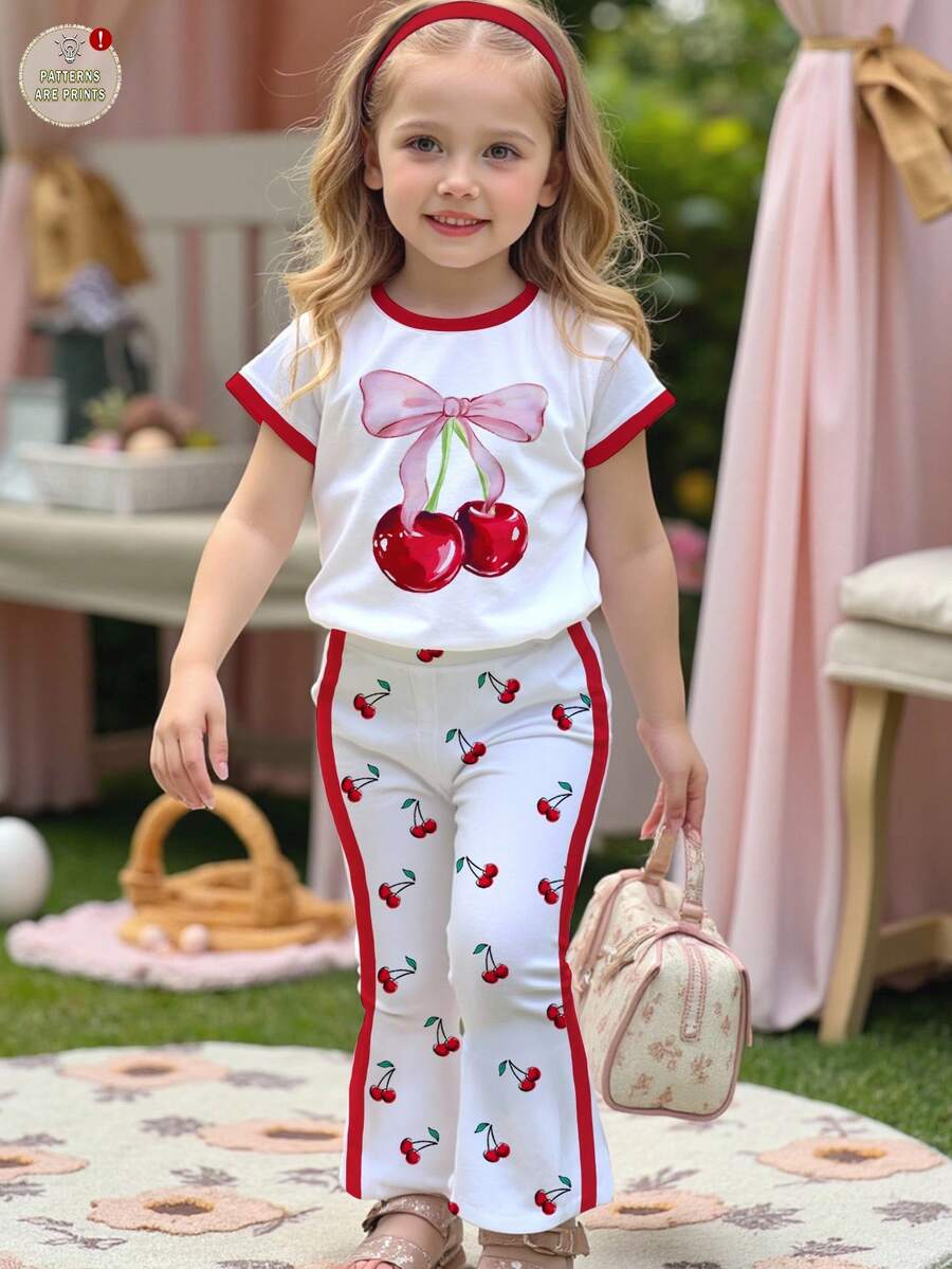 SHEIN Bộ 2 món cho bé gái, kiểu dáng thường ngày dễ thương, phong cách retro Mỹ, in hình nơ và quả anh đào, chấm bi và quả anh đào, viền đỏ, áo tay ngắn cổ tròn và quần ống loe, thích hợp cho mùa hè. - Nhiều màu - Xem 1