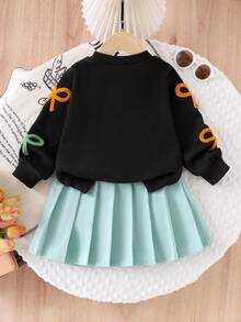 SHEIN Elladie kids Bộ 2 áo nỉ dệt kim dễ thương thường ngày cho bé gái, áo nơ dài tay và chân váy xếp ly màu xanh lá cây, thích hợp mặc vào mùa thu, ngày lễ và mặc hàng ngày - màu đen - Xem 2