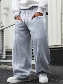 Manfinity EMRG 男士休闲街头风，百搭INS单品：宽松拼接运动裤，适合街头穿搭、日常休闲、周末郊游、音乐节、社交聚会等各种场合。这款裤子是男士衣橱中必备的百搭单品，也是送给男友或老公的绝佳礼物。街头风、朋友、情侣装、宽松、男士、印花、日系、男女皆宜、我爱我的女朋友 - 灰色 - 查看 7