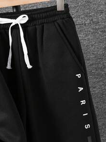 SHEIN 巴黎字母图案彩色条纹印花飞行员夹克搭配弹力腰带束脚裤两件套，适合春秋季休闲户外日常穿着，也适合生日派对、晚宴、演出、婚礼、洗礼、开幕式等场合。日常穿着舒适，适合上学、旅行、运动，尤其适合秋冬季节。 - 黑色 - 查看 8