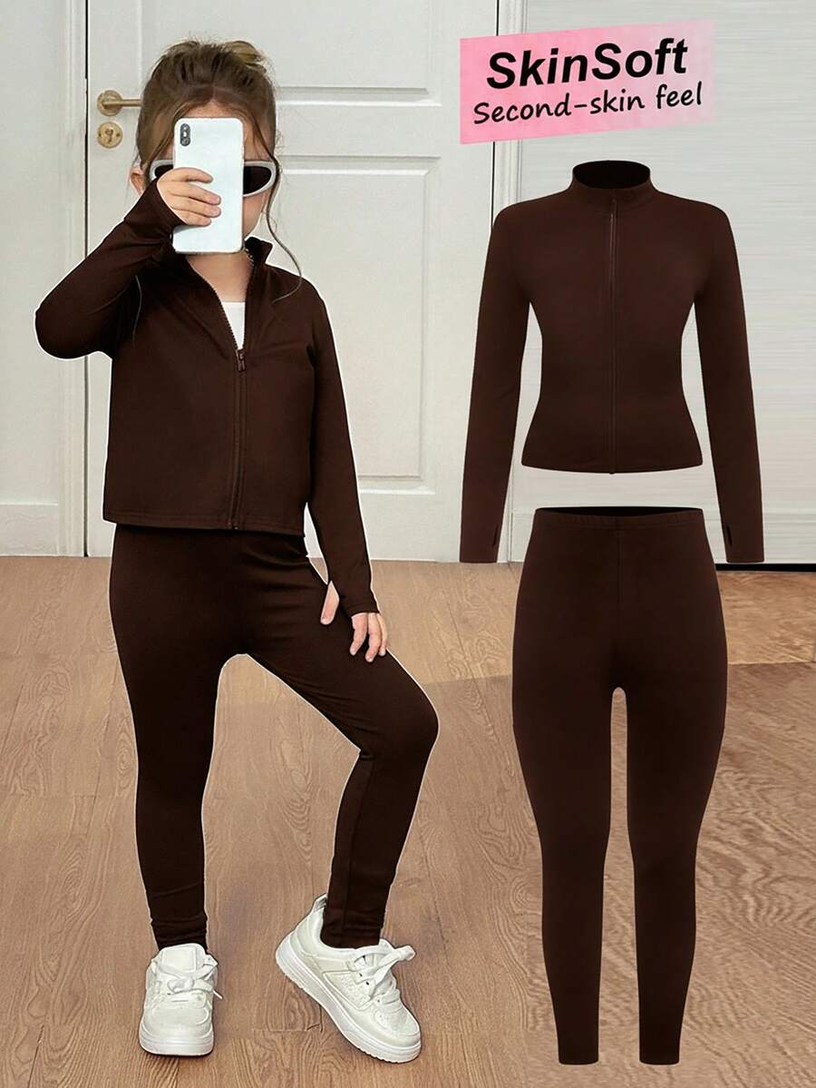 SHEIN مجموعة ملابس رياضية للفتاة الصغيرة تتكون من توب محبوك بياقة عالية مرنة وسحاب أمامي وسروال ضيق عالي الخصر، باللون الأسود، مناسبة للعودة إلى المدرسة، مجموعة سروال أسود قطعتين، مجموعة تمرين أسود، مجموعة رياضية للفتاة الصغيرة، مناسبة للارتداء اليومي والكاجوال في الصيف والخريف، متناسقة مع الأم والأخت، باللون الأسود. - قهوة بني - مشاهدة 1