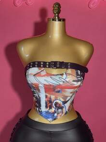 Slaydiva 2025 Nuevo estilo de invierno Año Nuevo Día de San Valentín Fiesta de noche Reunión de citas Fiesta de cumpleaños Estilo universitario Uso diario de estudiantes Básico versátil Casual Crucero Viaje Influencer Estilo de moda elegante Oficina informal Sencillo Sexy Club Estilo Y2K Punk Carreras Estilo oscuro Estilo femenino Motocicleta Parte superior de tubo Corte frontal Ajuste ceñido Corsé Bajo asimétrico Estampado de graffiti Parte superior de otoño/invierno Parte superior de Navidad Parte superior de Año Nuevo Parte superior de mujer