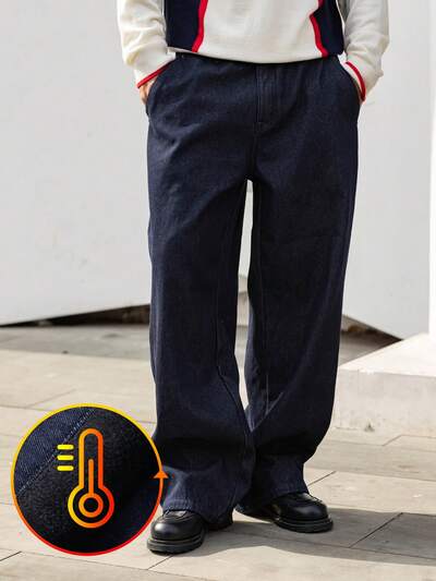 Męskie granatowe jeansy z surowym denimu z elastyczną talią i podszewką termiczną na jesień/zimę