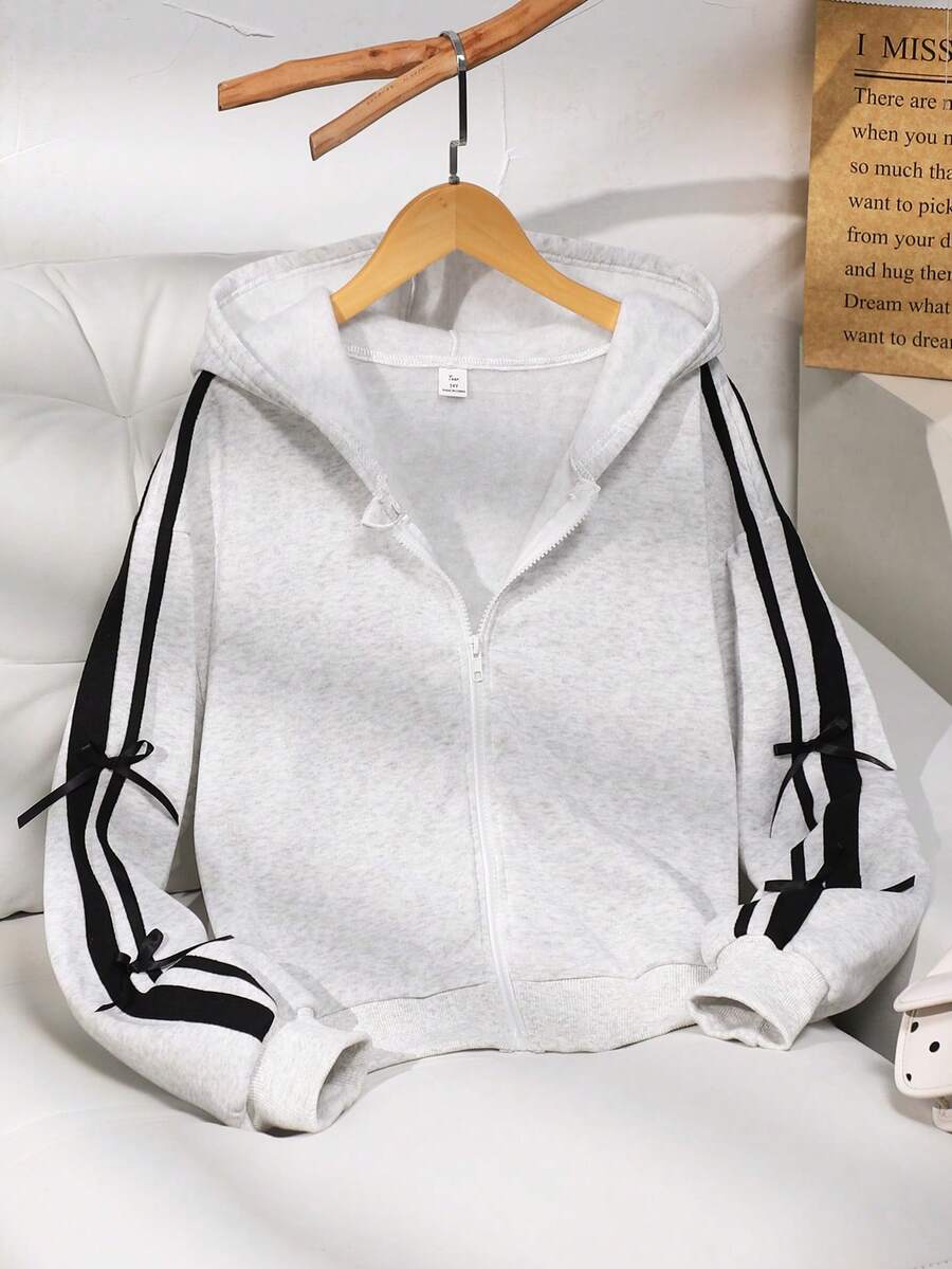 SHEIN 少女纯色时尚蝴蝶结卫衣外套,采用舒适的抓绒面料,时尚的袖子设计,整体展现青春活力少女风,适合返校季或日常户外穿着。 - 白色 - 查看 1