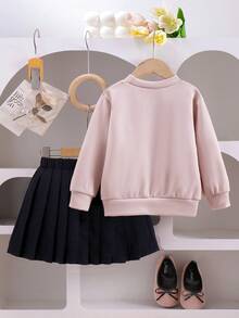 SHEIN Elladie kids 2 件女童休闲可爱针织运动衫套装，长袖蝴蝶结上衣和黑色百褶裙，适合秋季、假日和日常穿着 - 杏色 - 查看 2